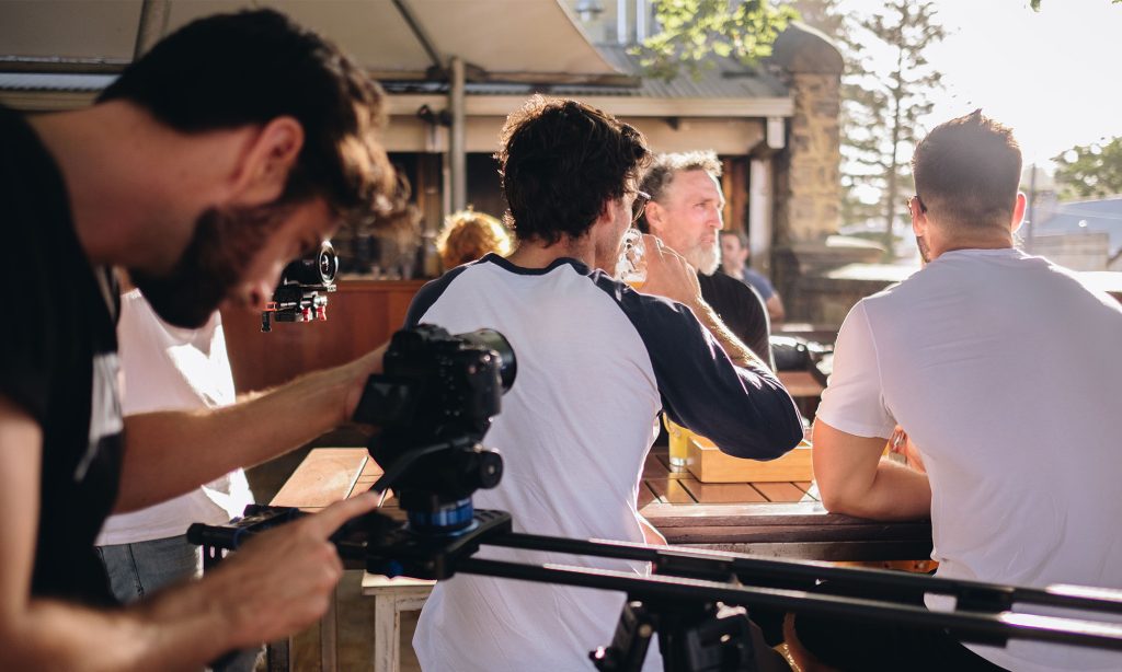 A Birdhouse Media camera operator filming the Norfolk Hotel cinema ad in Fremantle.